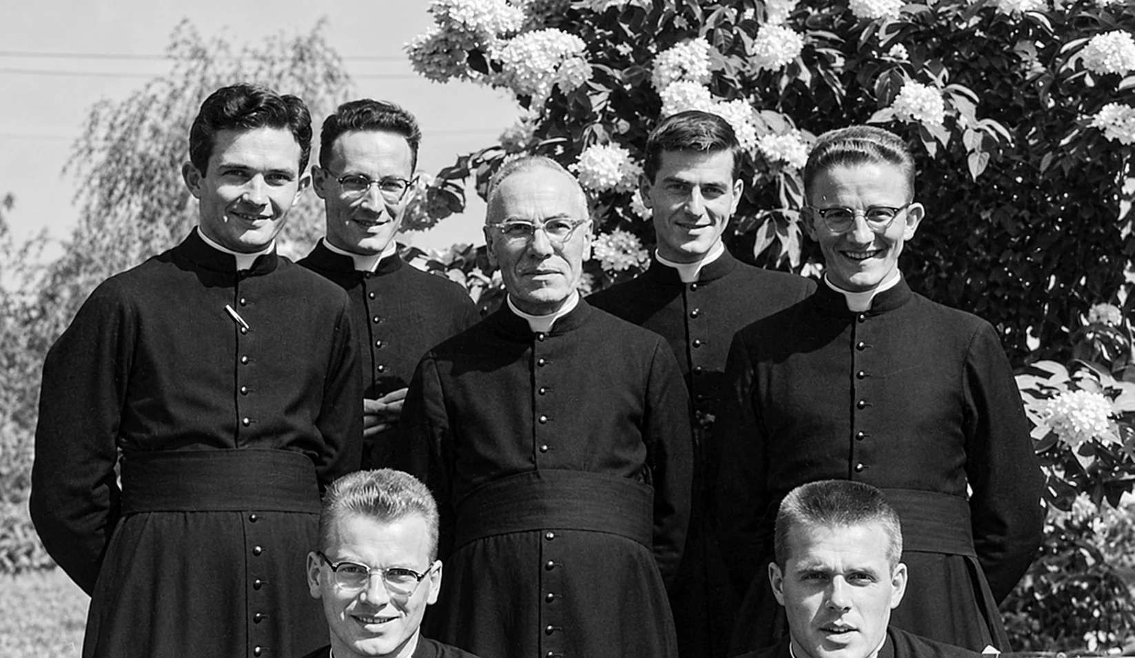Incorporated seminarians, including Father Quirion